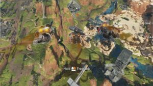 Apex Legends class list and class perks explained: A squad of three Legends dive downwards, flying towards a grey metal building surrounded by tall grass and steep cliffs as they land on a battle royal map.
