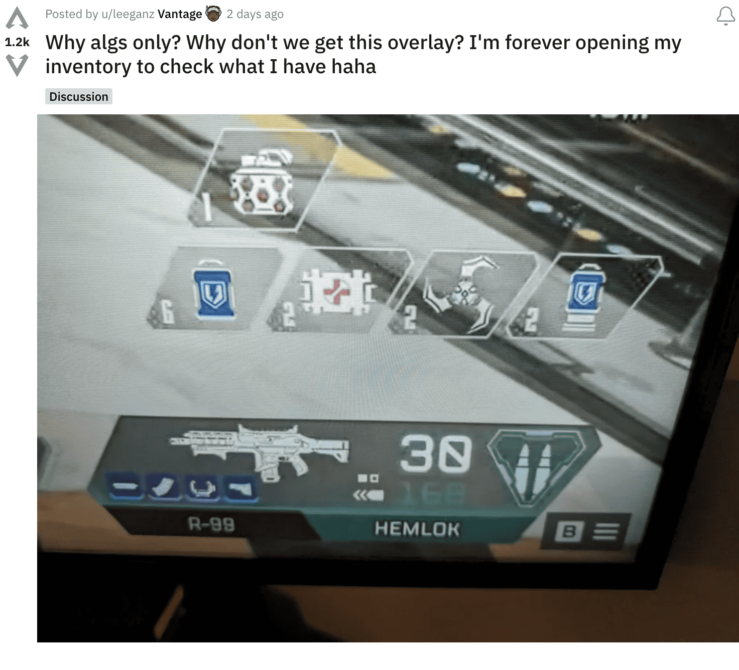 A TV screen displaying Apex Legends UI feature with a gun on it gets discussed by gamers.