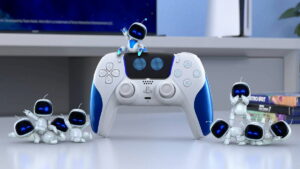 Image of the limited edition DualSense Wireless Controller with several Astro Bots around it.