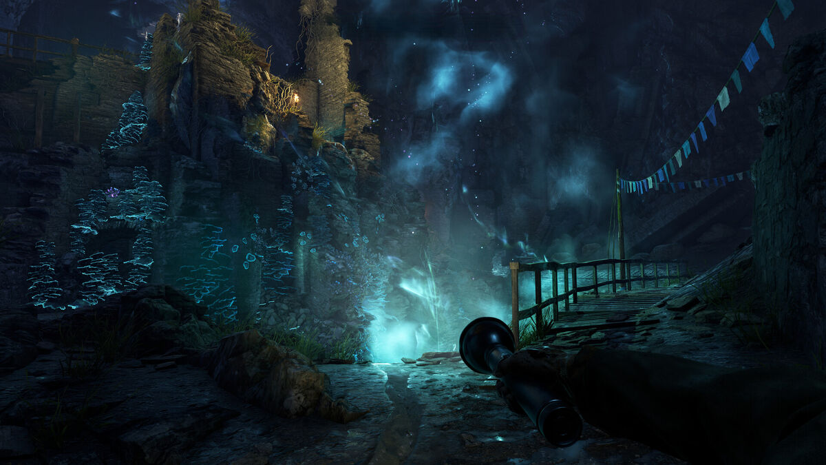 Atomfall Switch: dark cave lit by a flashlight.