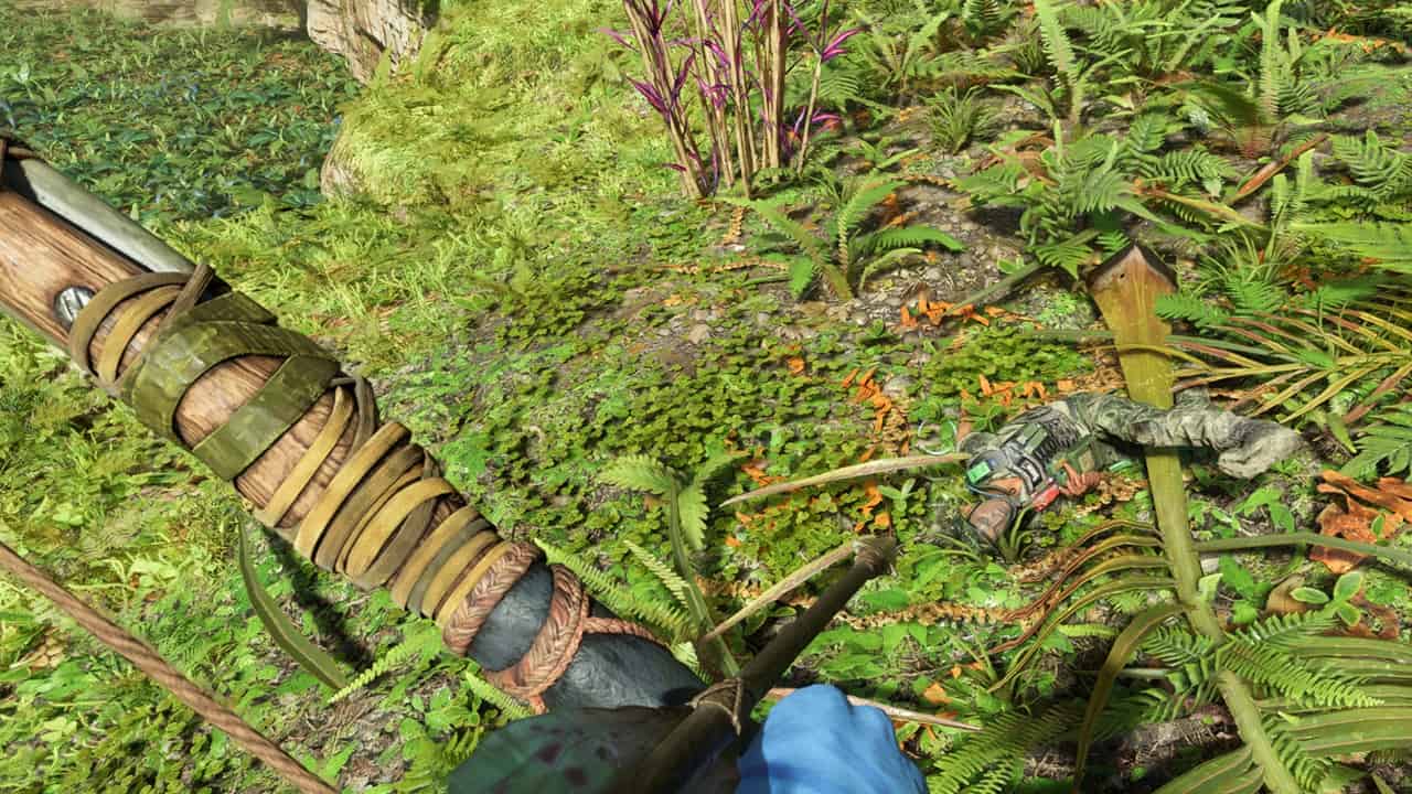 A bow aimed at a soldier in Avatar: Frontiers of Pandora. Image captured by VideoGamer.