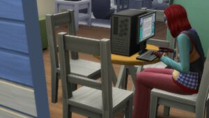 A Sim called Penelope Garcia writing a freelance article for work about the best laptop for Sims 4 in her house. She's got red hair and brightly colored clothes