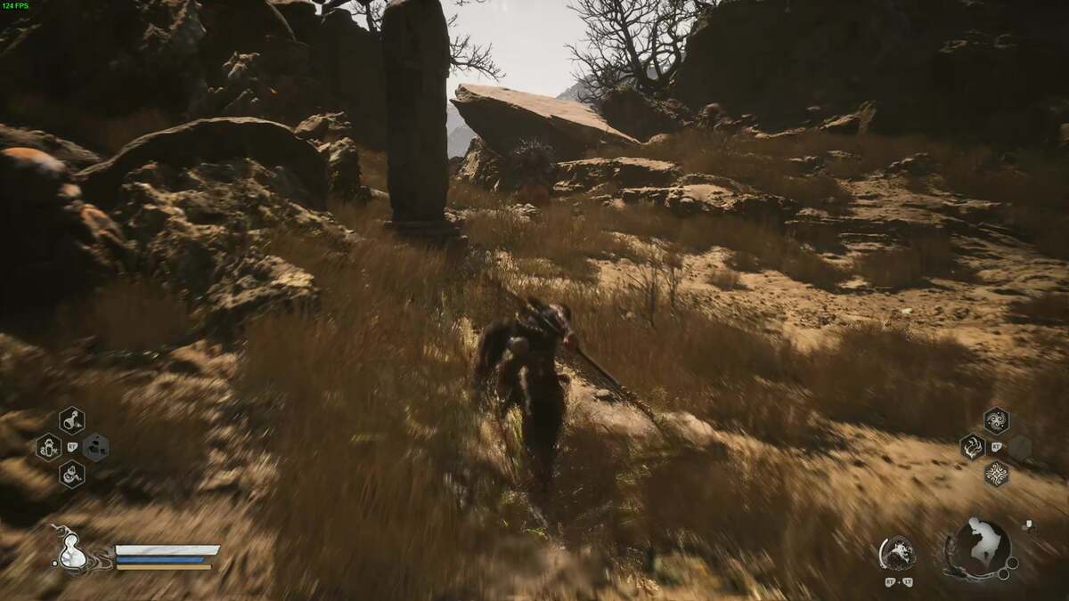 Black Myth Wukong how to sober up drunk pig: A player running up a hill in a dusty area in Black Myth Wukong.