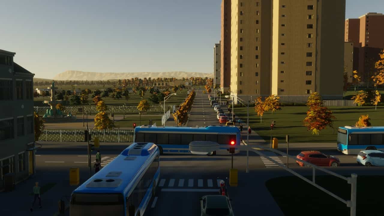 Cities Skylines 2 Game Pass: A screenshot of a bustling city showing buses traversing amidst tall buildings.