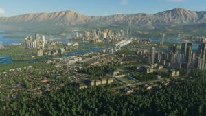 Cities Skylines 2 preload: An aerial view of a city with mountains in the background.