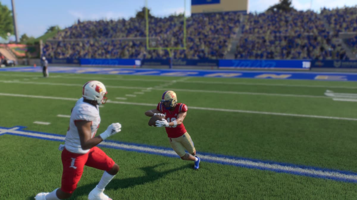 A wide receiver catches the ball on offense in College Football 25