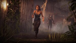 Image of Lara Croft running away in Dead by Daylight,with the Killer Trapper following behind her.