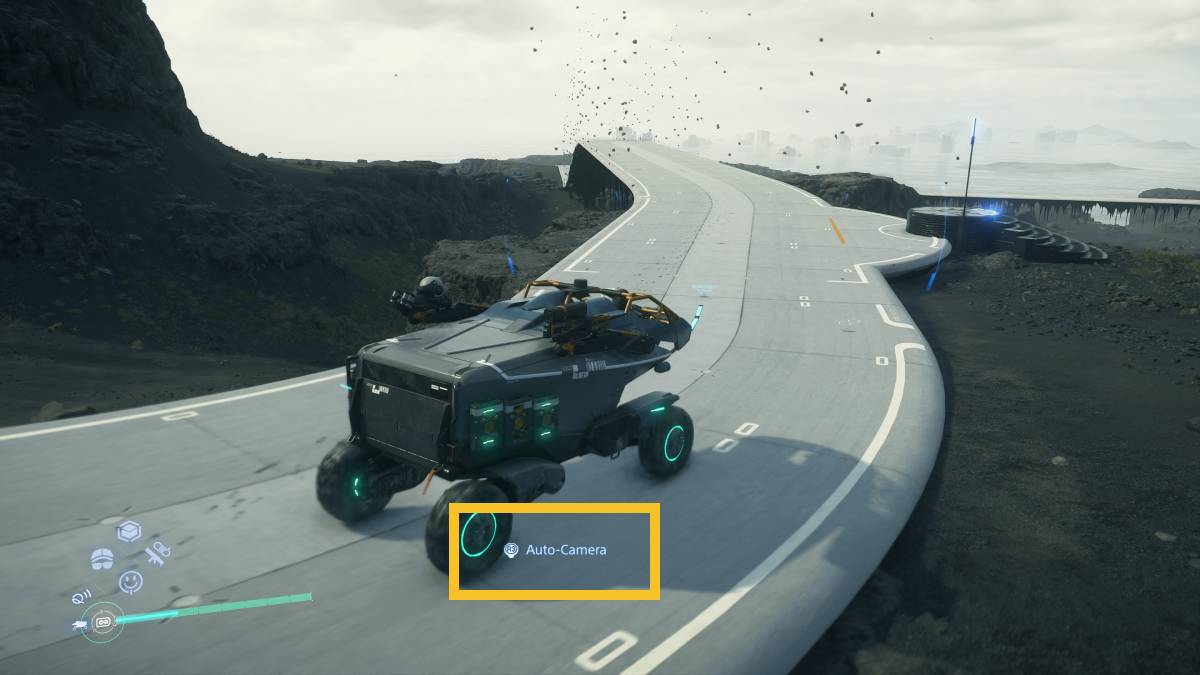 Death Stranding 2 auto drive: Pickup Off-Roader driving on a road.