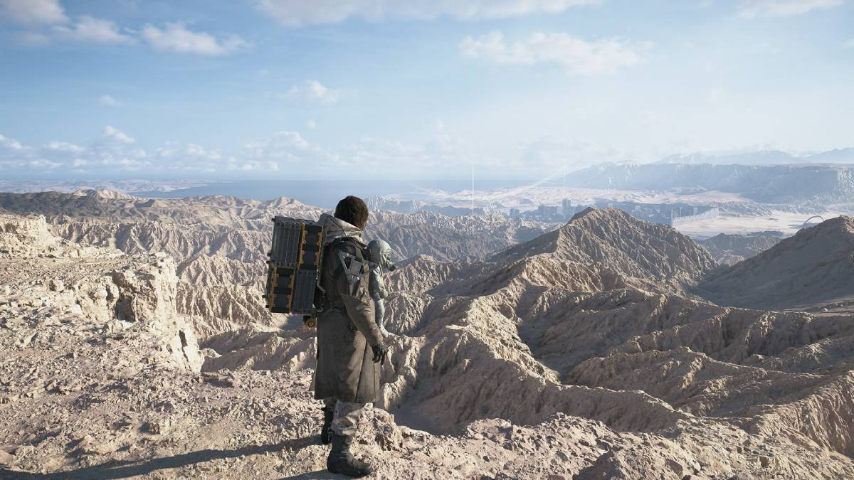Death Stranding 2 multiplayer co-op: Sam Bridges looking over ridged mountain range.