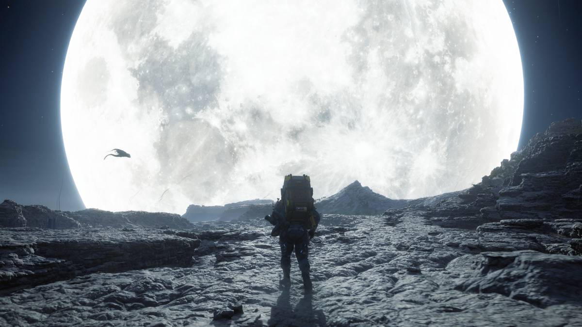 Death Stranding 2 PC: Sam walk at night with the moon in the background.
