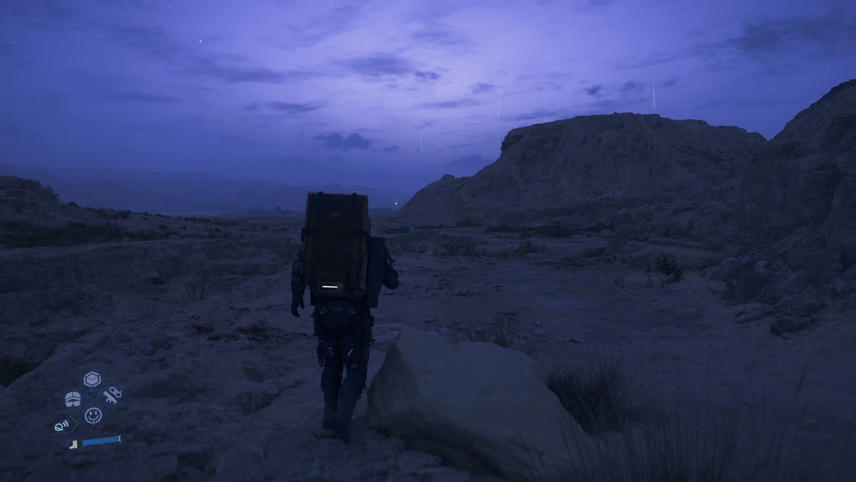 Death Stranding 2 review: Sam trekking at night.