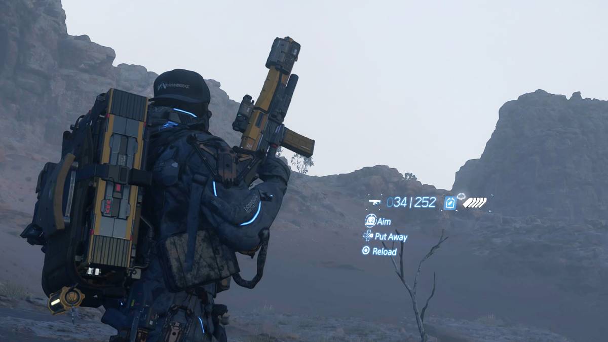 Death Stranding 2 weapons: Sam brandishing an assault rifle.