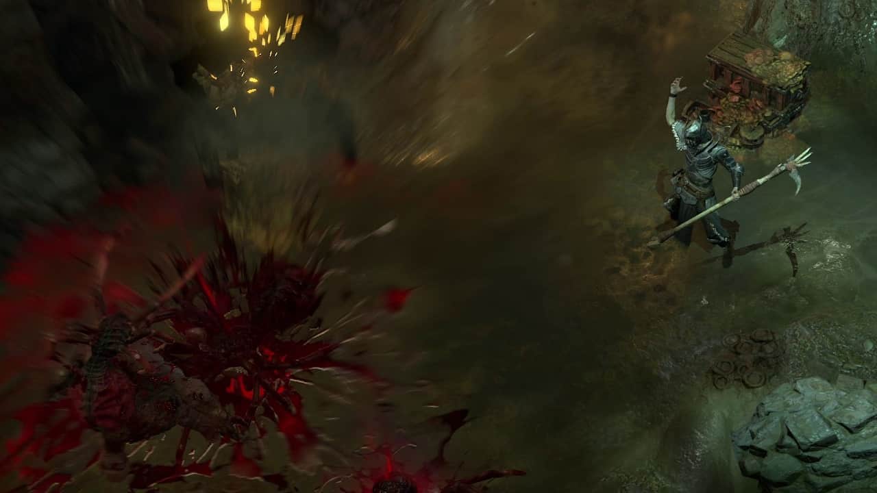 Diablo 4 Black River: A Necromancer uses the Corpse Explosion skill on Spiders in a cave inside the game.