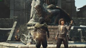 Dragon's Dogma 2 A Beggar's Tale: Albert and Arisen standing in front of a dragon statue in the Merchant Quarter of Vernworth.