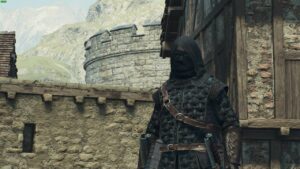 Dragon's Dogma 2 gifts: thief in Verworth with hood on.