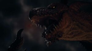 Dragon's Dogma 2 Max Level: A menacing dragon from Dragon's Dogma 2 with open jaws highlighted by dramatic lighting.