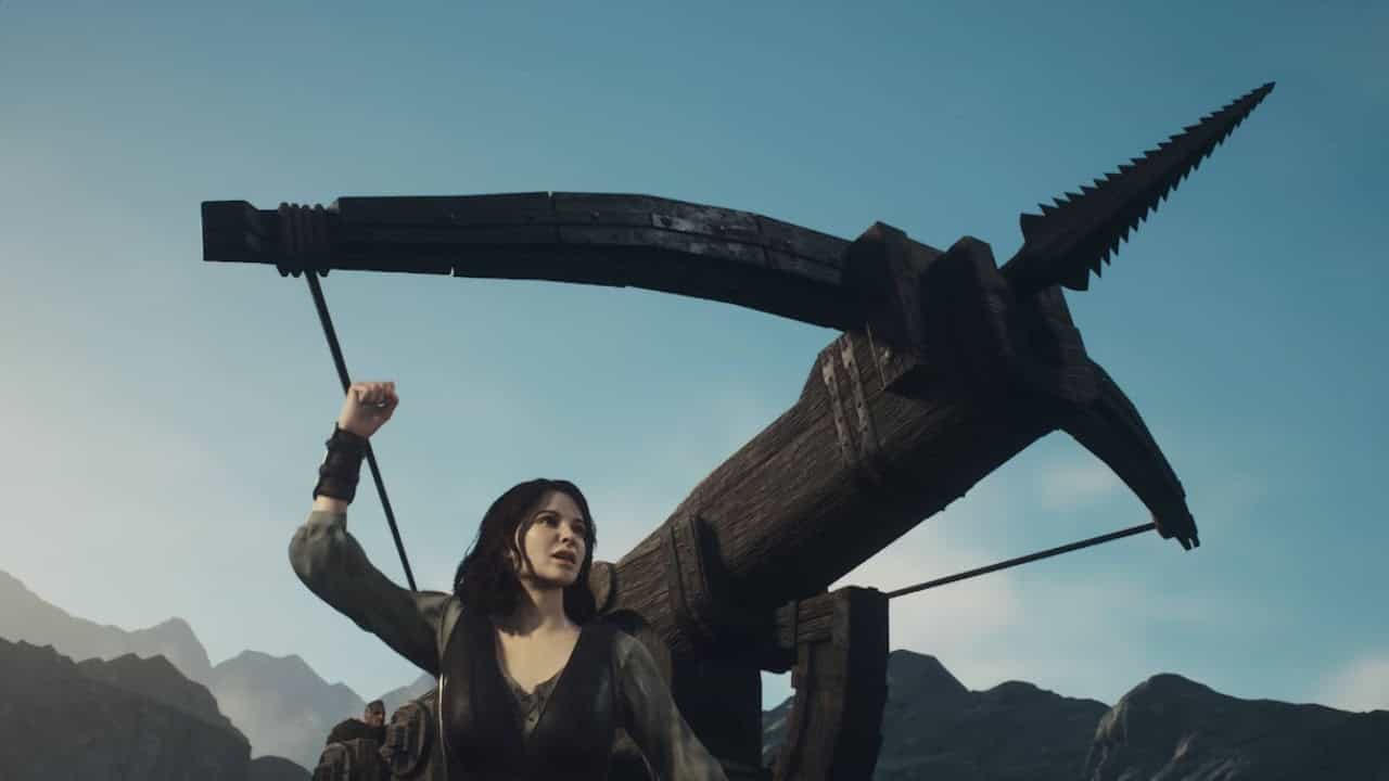 Dragon's Dogma 2 missable content: Ulrika orders a ballista to be fired in the game. Image captured by VideoGamer.