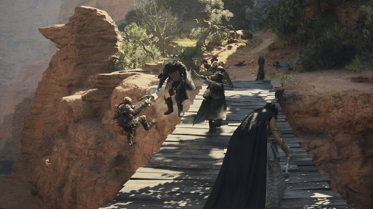 Dragon's Dogma 2 pawn impermanence: An image of a player on a bridge with an ally falling off the bridge. Image captured by VideoGamer.