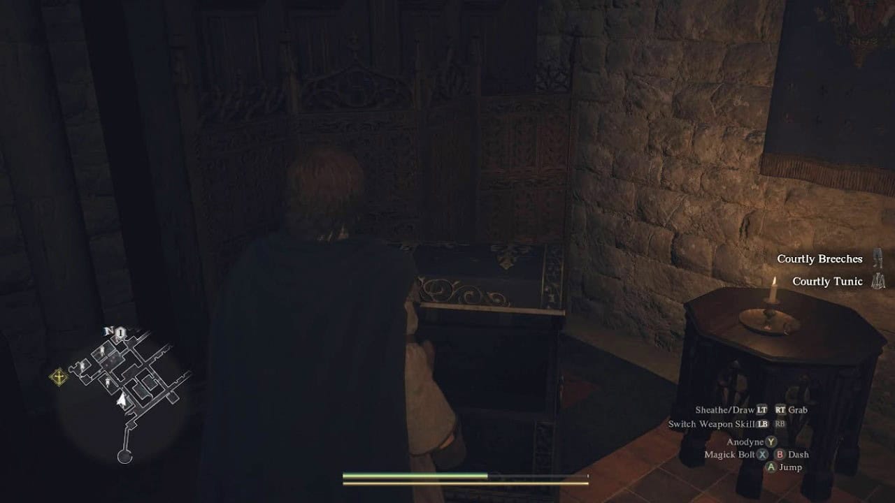 Dragon's Dogma 2 The Stolen Throne: A player next to a chest after acquiring courtly clothes. Image captured by VideoGamer.