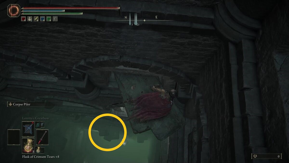 Elden Ring Fingerprint Stone Shield: A player standing on a coffin with a gold ring marking another coffin to the left.