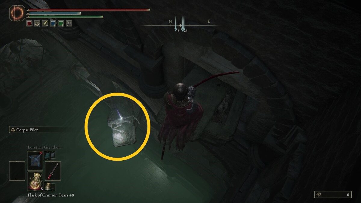 Elden Ring Fingerprint Stone Shield: A player standing on a coffin with a gold ring marking another coffin to the left.