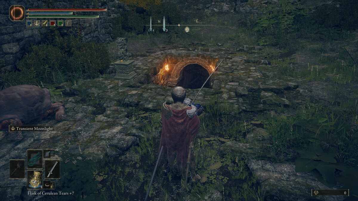 Elden Ring Green Turtle Talisman: A player standing next to some stairs leading down to a dark tunnel.