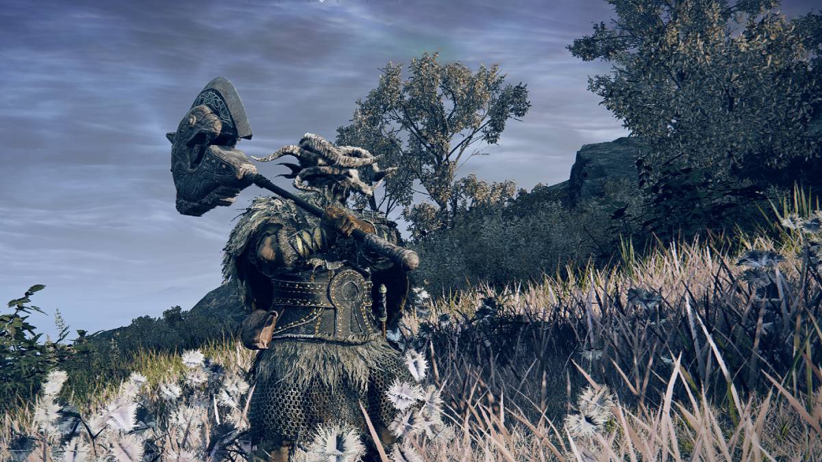 Elden Ring Nightreign two-hand weapons: Raider two-handing a weapon in Limveld.