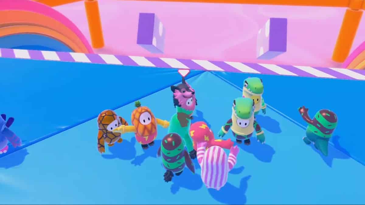 A group of cartoon characters are standing on a blue surface, engaging in fun and exciting games.