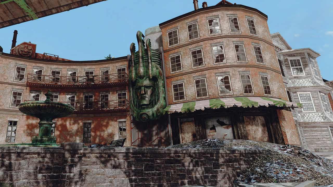 Fallout 4 best mods: A dilapidated urban scene with a moss-laden face sculpture. Image via Nexus Mods.