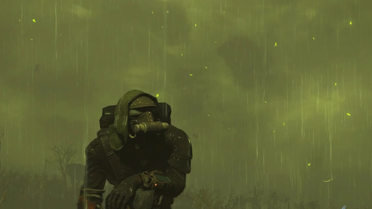 Fallout 4 best mods: A person in a gas mask and dark protective clothing stands in a heavy green rainstorm. Image via Nexus Mods.