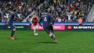 FM 24 best young CDMs: Ugarte preparing to tackle Trossard during a match.