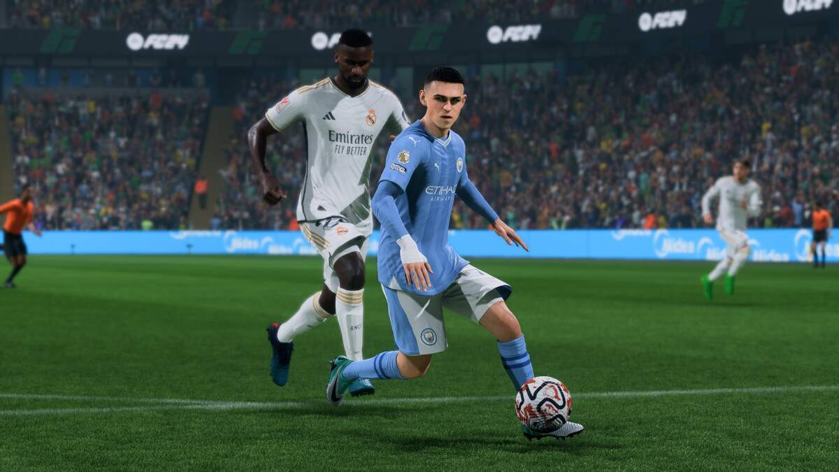 FC 24 best young LWs: Phil Foden dribbling into the box.
