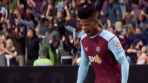 A relentless winger is celebrating in front of a crowd.