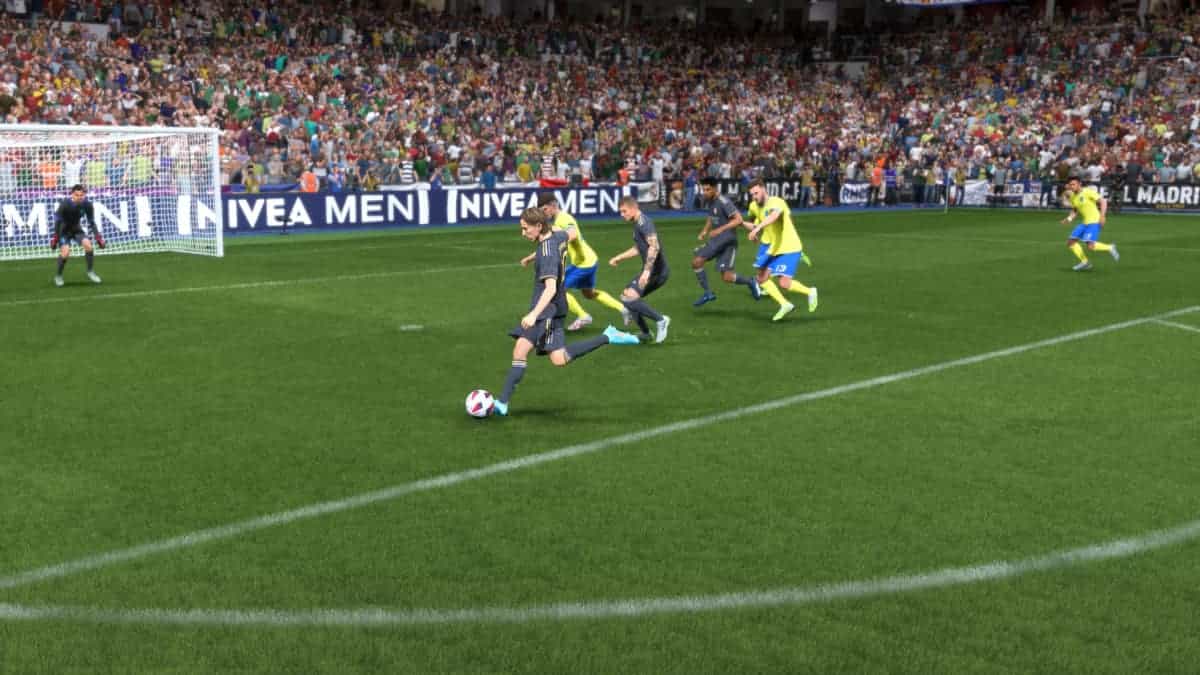 A screenshot of FC 24 TOTW 14 - Osimhen and Luka Modric lead the way in EA's latest soccer game.
