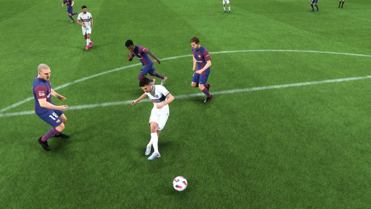 A soccer game featuring players from FC 24, playing on a green field.