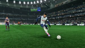 FC 25 FUT Champs rewards: Son Heung-min dribbling a ball for Tottenham during a match at night.