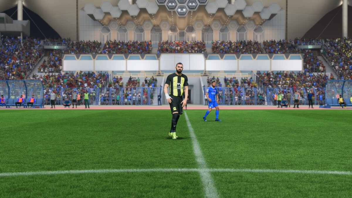 FC 25 best Saudi Pro League players: Karim Benzema sttanding on the touchline for Al-Ittihad