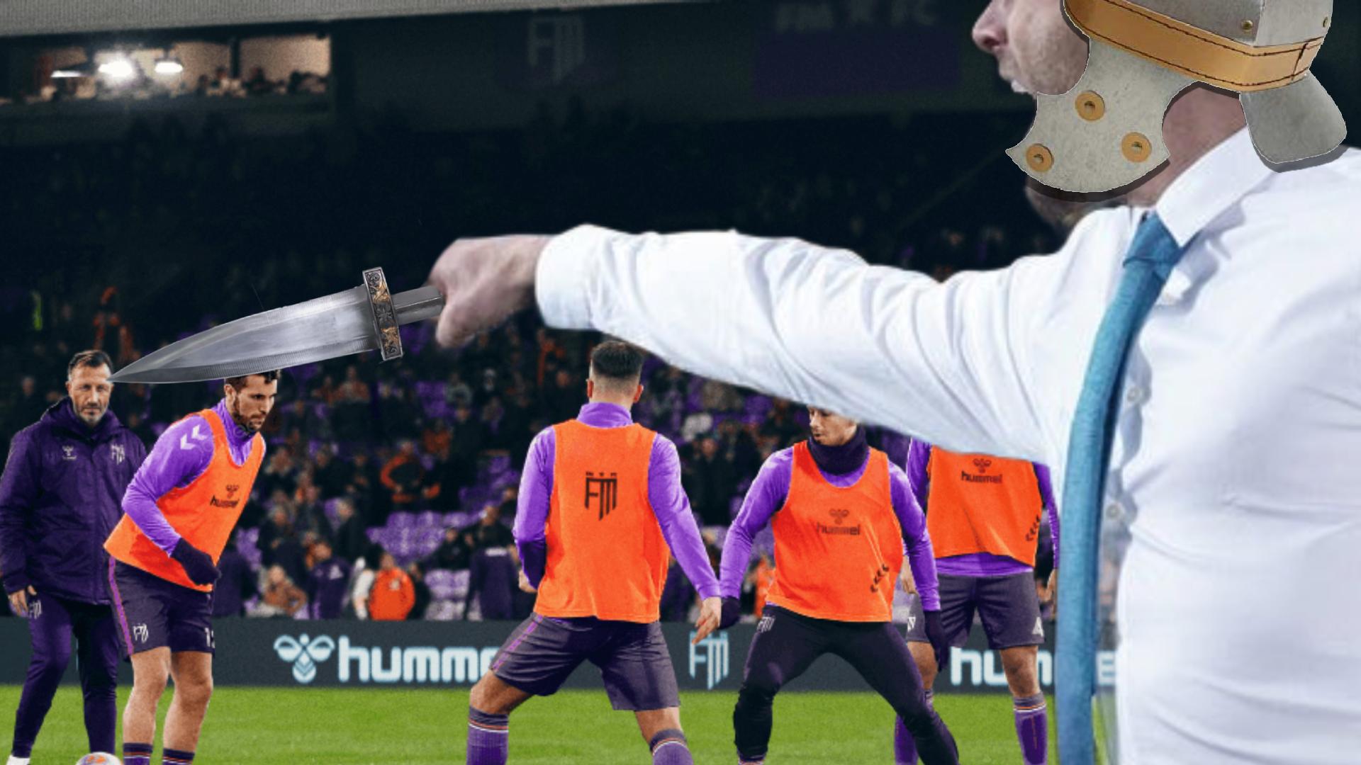 Football Manager holding a dagger and wearing a roman helmet