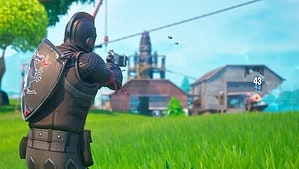 A man is using precise aim while shooting in Fortnite.