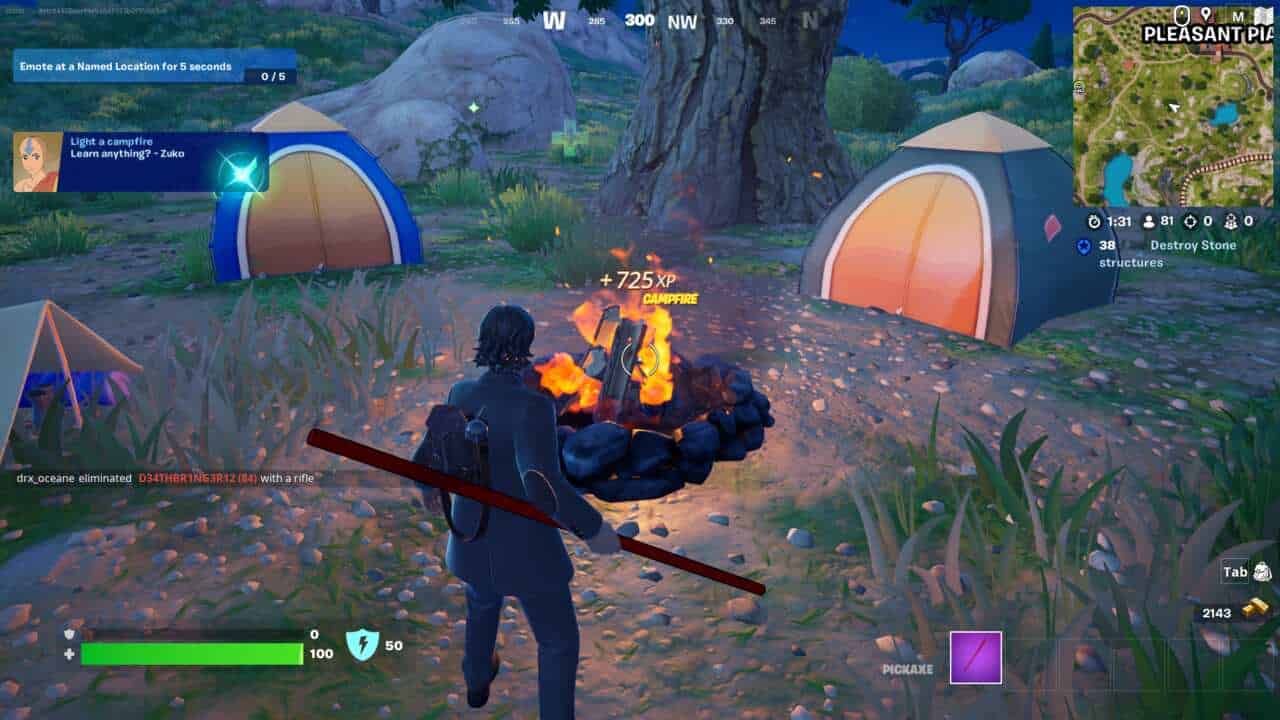 Fortnite campfire locations: A player standing next to a lit campfire surrounded by tents in Fortnite.