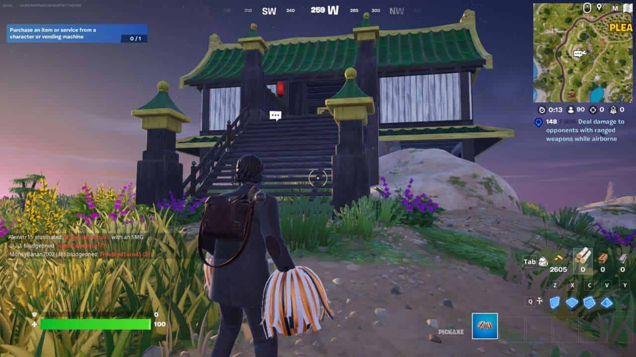Fortnite elemental shrine locations: A player in front of an earth shrine.