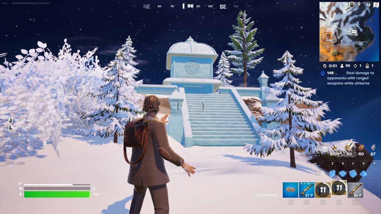 Fortnite elemental shrine locations: A player in front of some icy stairs leading to a water shrine.