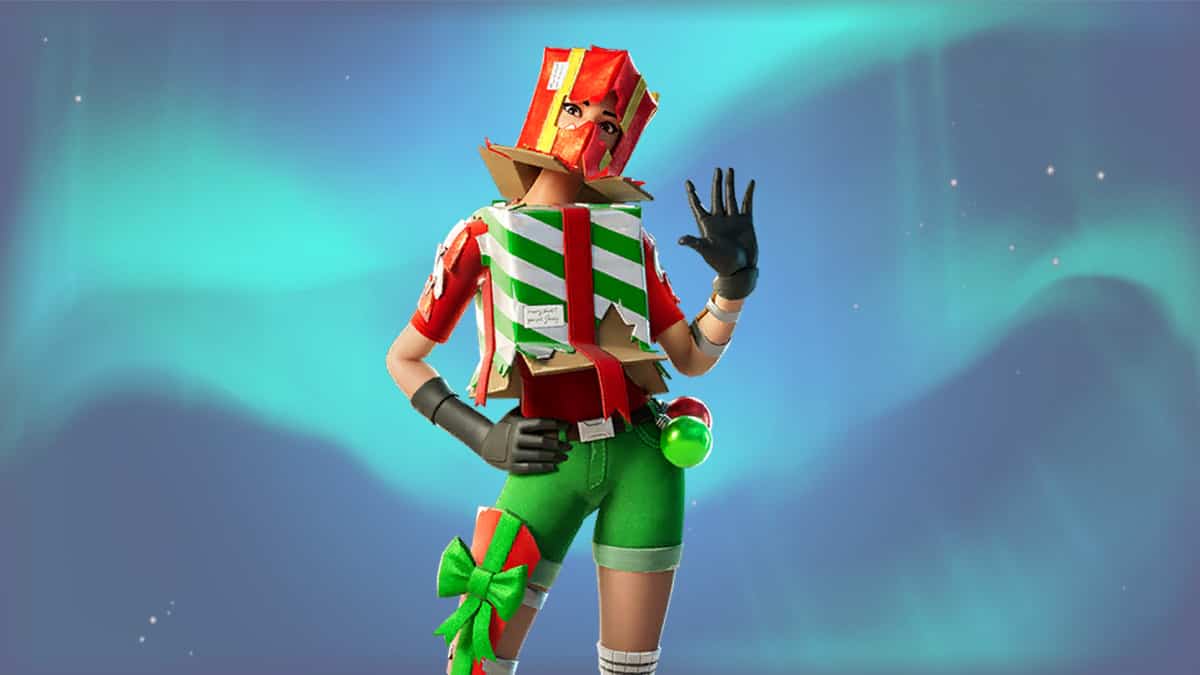 A Fortnite character in a green holiday outfit.