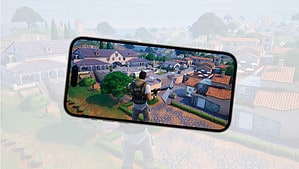A fortnite iPhone screen showing a man playing a game, but there is a twist - Fortnite is coming back to iOS.