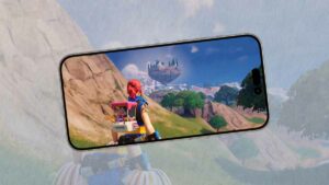 A smartphone displaying a Fortnite game scene with a character riding a cart on a colorful landscape towards a distant castle.