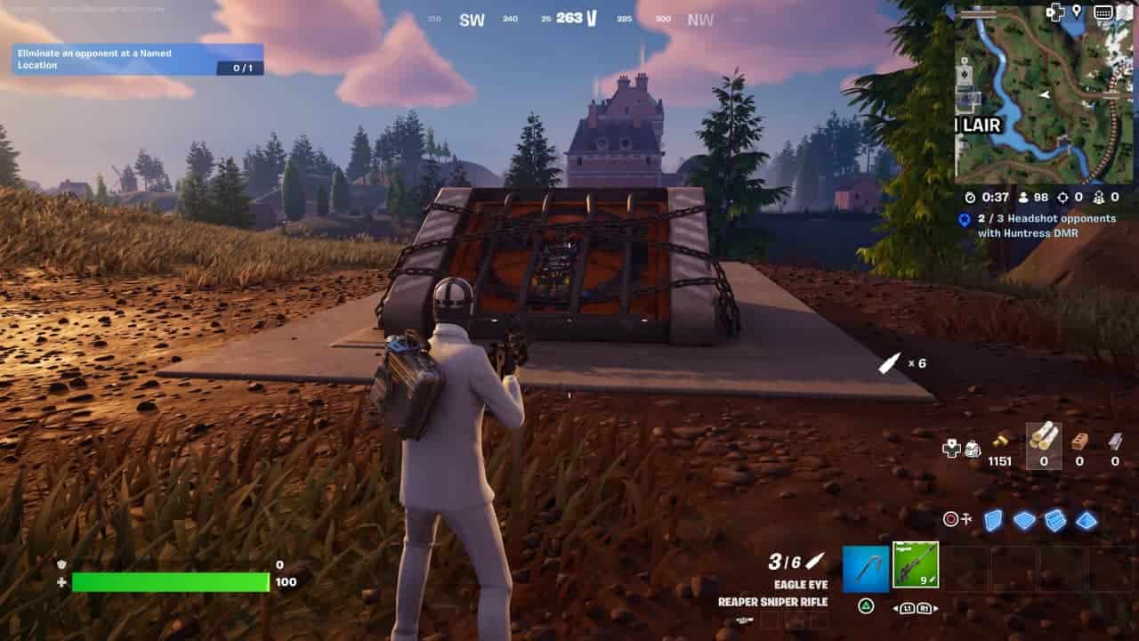 A player in a white suit aiming with a sniper rifle in the game Fortnite, with a wooden structure and all Fortnite bunker mod bench locations in the background.