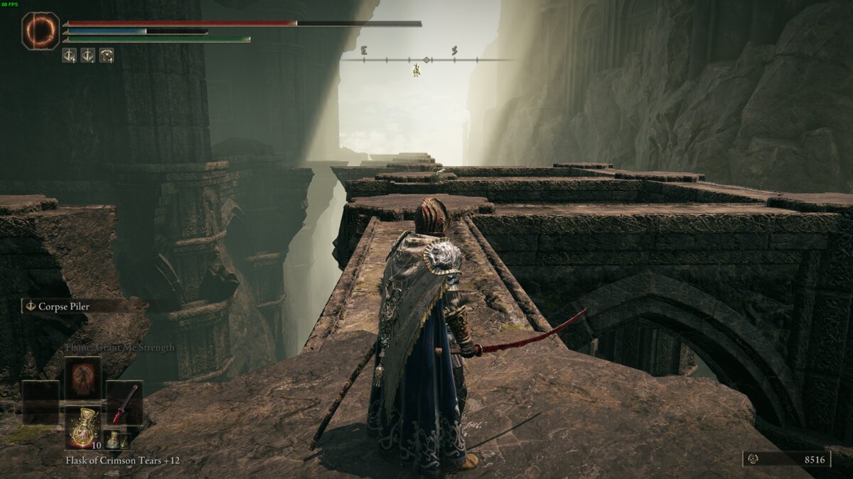 Elden Ring Shadow of the Erdtree giant rauh: Tarnished in the Rauh ruins.