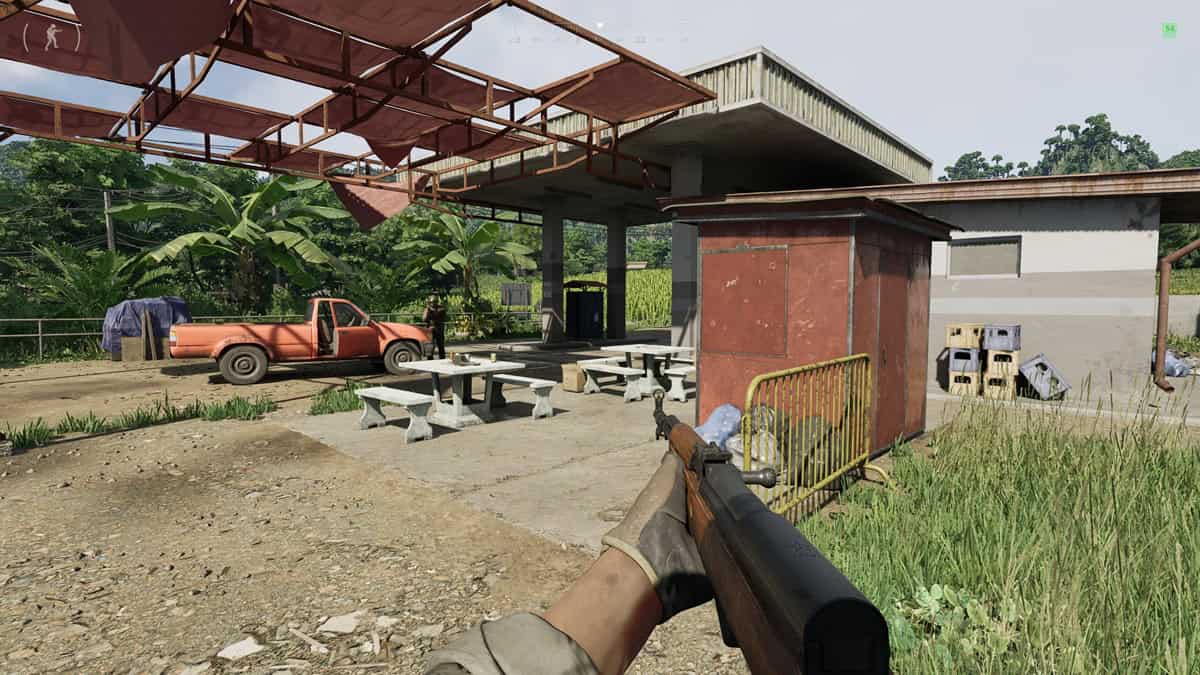 A player wields the SKS and walks near a building.
