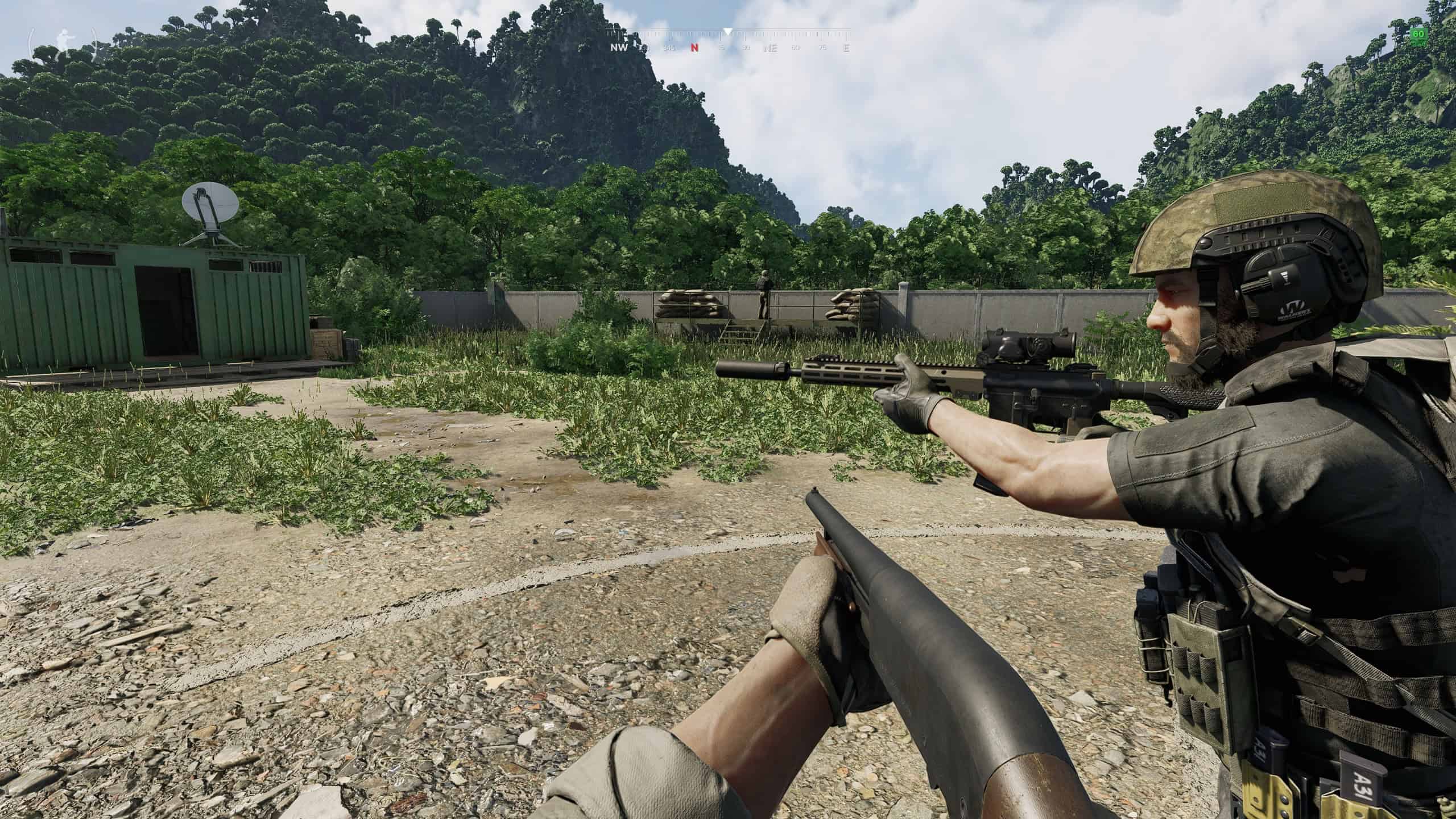 A player wields a shotgun and stands next to another player.