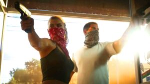 GTA 6 gameplay footage showing Lucia and the other one aiming weapons